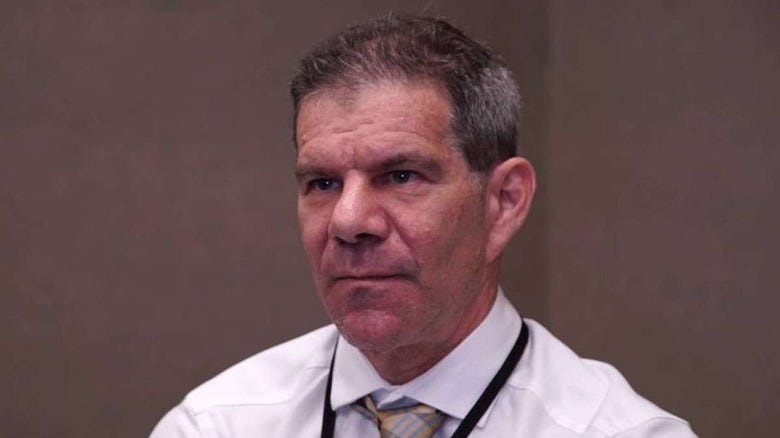 Dave Meltzer wearing a shirt and tie