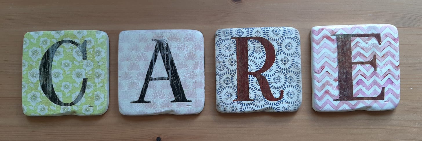 Four placemats spelling CARE