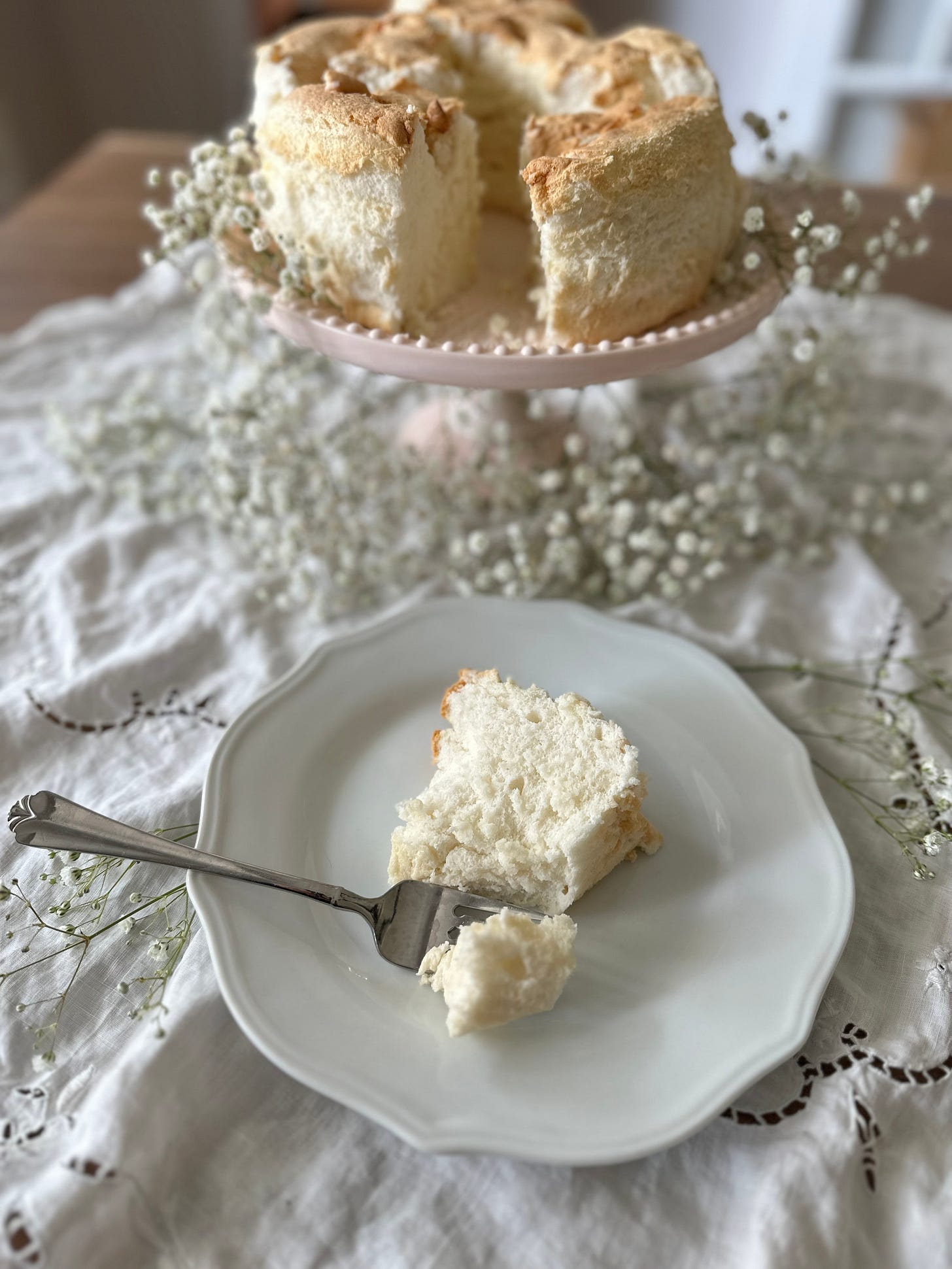 A plate with a slice of Angel Food Cake