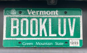 Vermont license plate that reads BOOKLUV