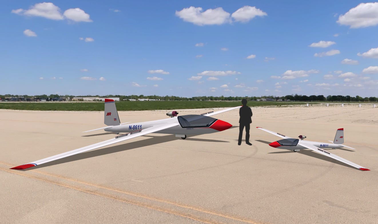 Image of Full-scale and 44% scale versions of the jet powered Swift S-1 aerobatic sailplanes (pilot for size reference)
