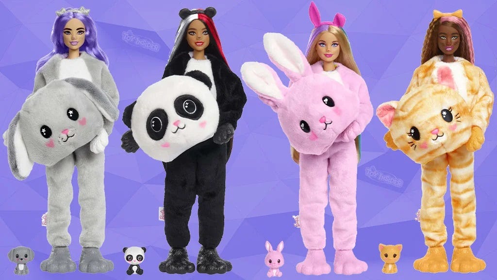 photo of four "Cutie Reveal" Barbie dolls in furry outfits, carrying huge heads: a grey puppy, a panda, a pink bunny, and an orange-striped kitty