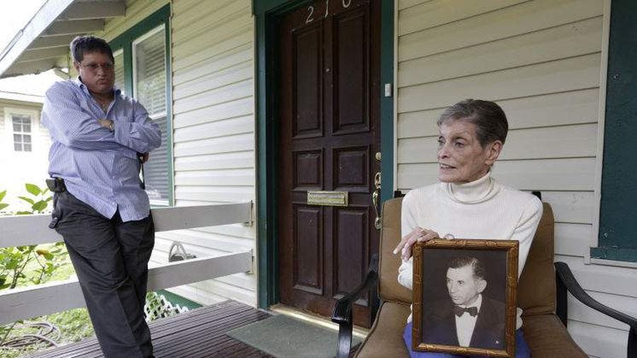 Sandra Lansky, with her son Gary Rapoport on the porch of their Seminole Heights home, holds a photo of her father, Meyer Lansky. “They spolied me rotten,” Lansky says of the many mob men she called uncle.