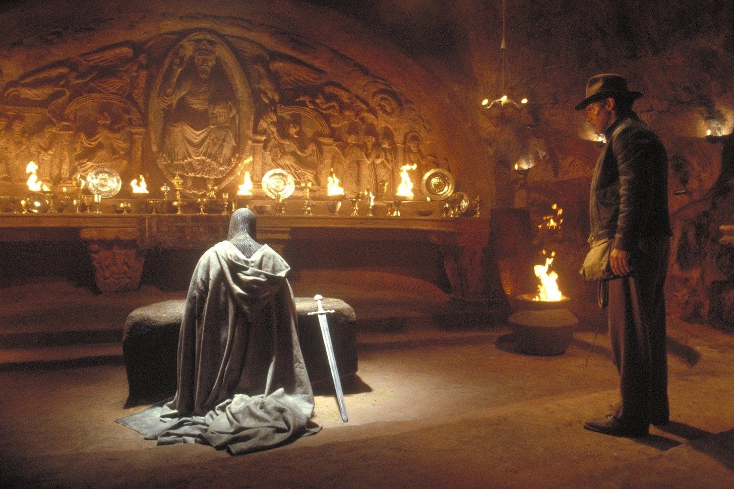 Image: A still from the climax of Indiana Jones and the Last Crusade, as Indiana Jones must choose the correct Holy Grail from countless imposters 