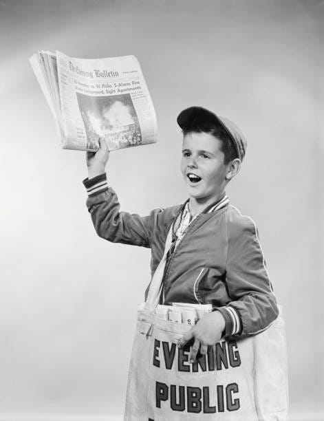 paperboy selling newspapers, holding paper up in one hand, with bag of papers over shoulder, philadelphia, pennsylvania, usa. (photo by h. armstrong roberts/retrofile/getty images) - kid selling newspaper stock pictures, royalty-free photos & images