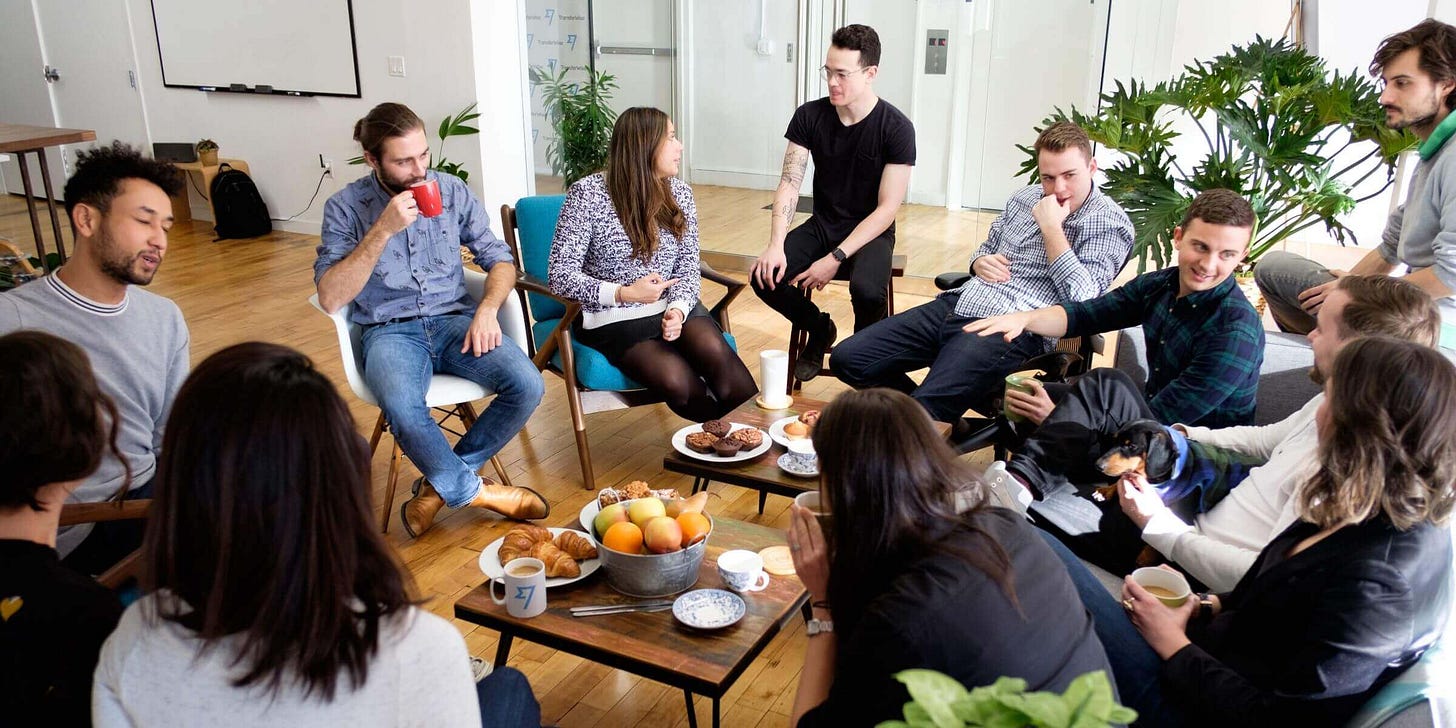 Photo of an all-white Swedish office team, reflecting the racial homogeneity of workplaces despite a diverse population