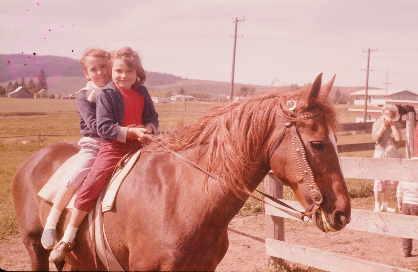 two children on one horse