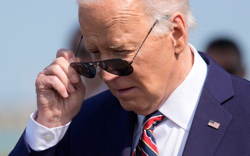 US President Joe Biden adjusts his sunglasses as he arrives on Air Force One at Boston-Logan International Airport, Tuesday, May 21, 2024, in East Boston, Mass. (AP/Alex Brandon)