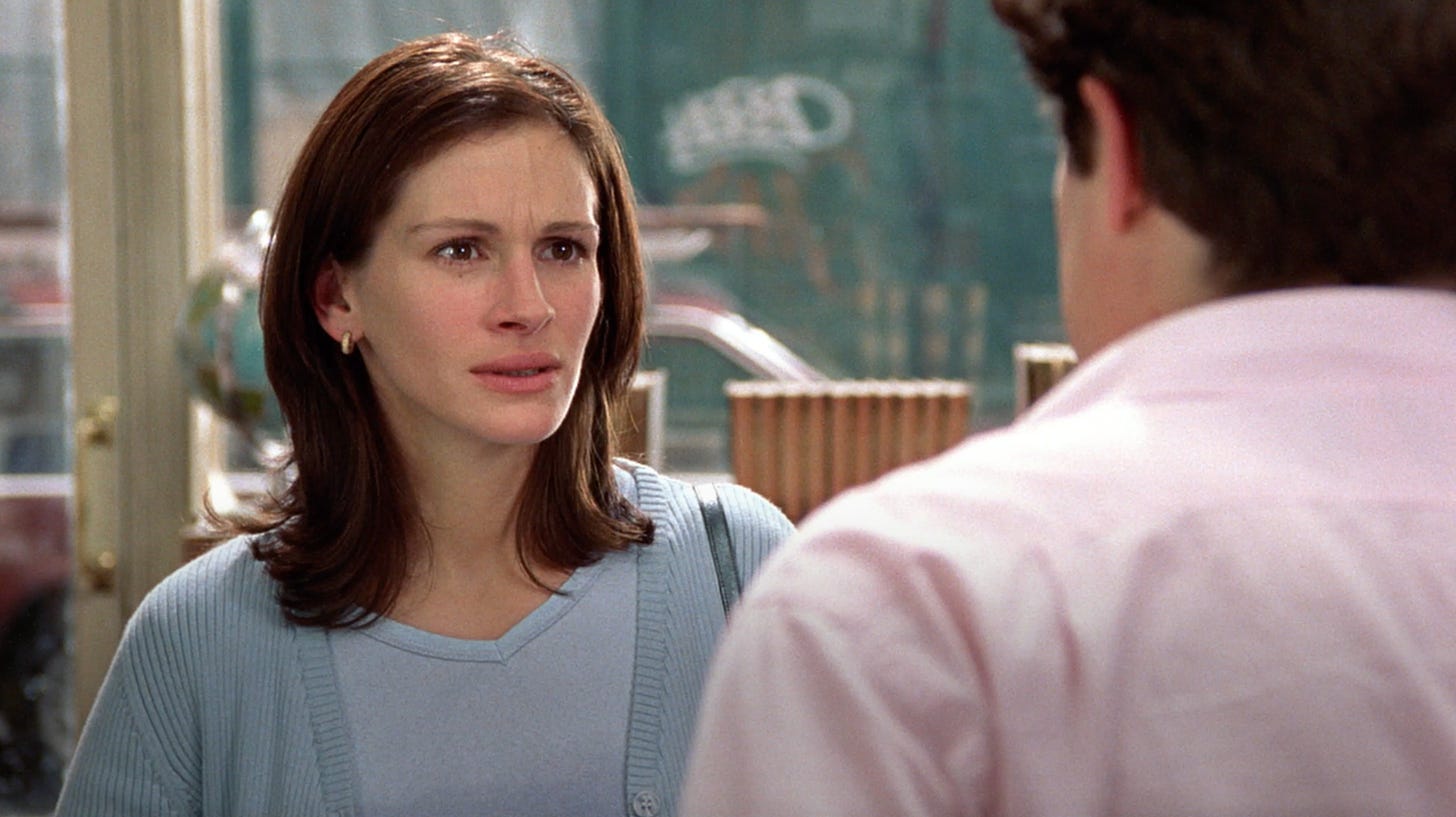 Julia Roberts looking at Hugh Grant in Notting Hill, asking him to love her.