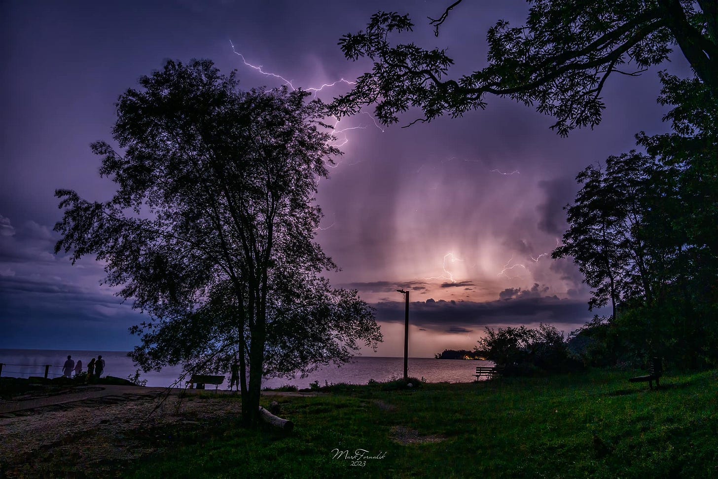 May be an image of 1 person, lightning, twilight and nature