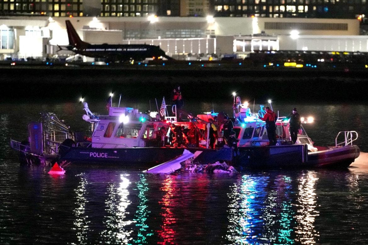 Emergency divers respond after plane and helicopter crash in the Potomac River.