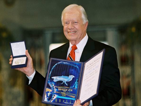 Carter is awarded the Nobel Peace Prize in Oslo, Norway, in December 2002. He was recognized for his many years of public service, and in his acceptance speech he urged others to work for peace.