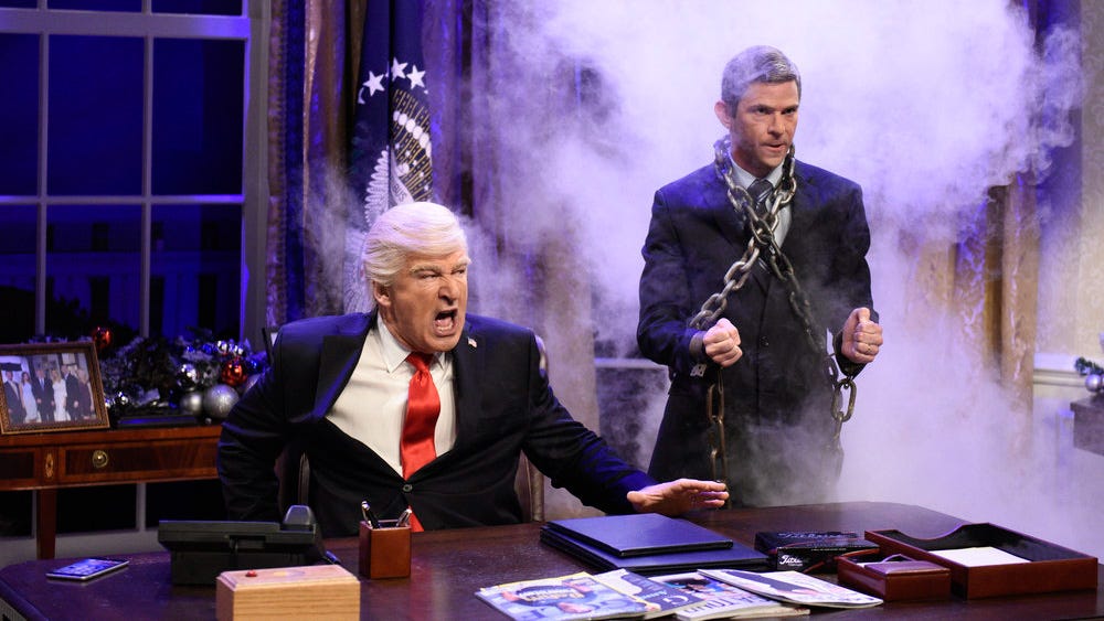 SATURDAY NIGHT LIVE -- Episode 1732 -- Pictured: (l-r) Alec Baldwin as President Donald J. Trump, Mikey Day as Michael Flynn during "White House Cold Open" in Studio 8H on Saturday, December 2, 2017 -- (Photo by: Will Heath/NBC)
