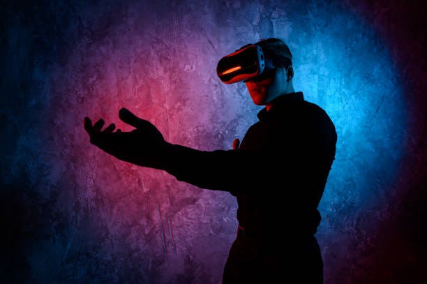 Young man playing a virtual reality video game. Vr game with shotgun Young man playing a virtual reality video game haptic technology stock pictures, royalty-free photos & images