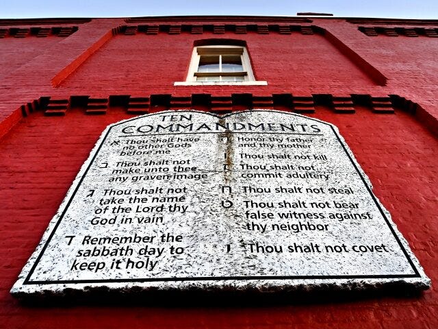 JASPER, GA- OCT 07: A copy of the Ten Commandments in stone hang on a building next to the Pickens County Courthouse in Jasper, Georgia on October 07, 2022. The courthouse was the scene earlier this year for a case where the local GOP wanted a hand recount of paper …