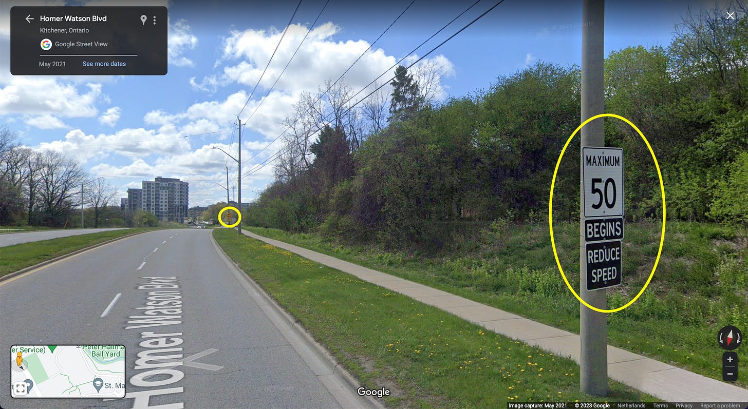 A google streetview of a speed limit reduction immediately preceding a roundabout in Kitchener Ontario.