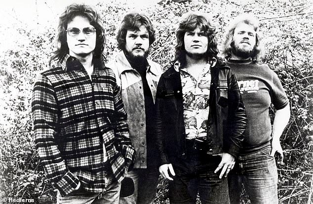 Bachman (second from right) pictured with Bachman-Turner Overdrive band members