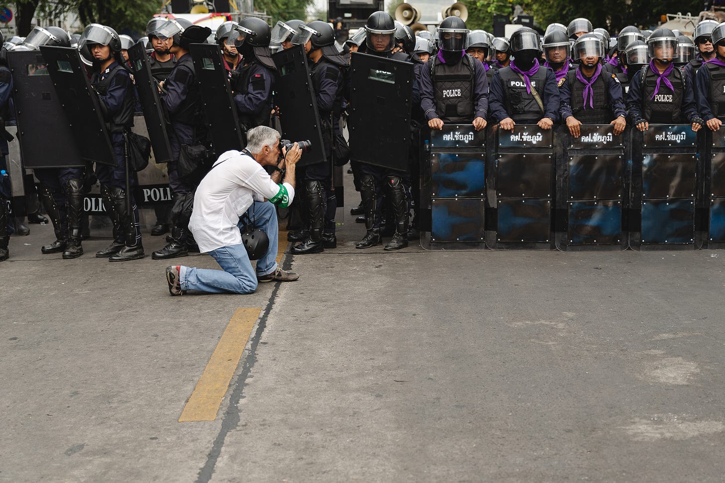 James Nachtwey photographing police lines, Bangkok, Thailand.