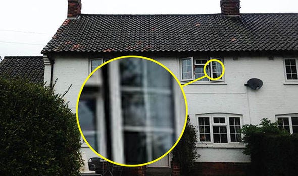 Proof of afterlife in photo, haunted cottage ghost stands in ...