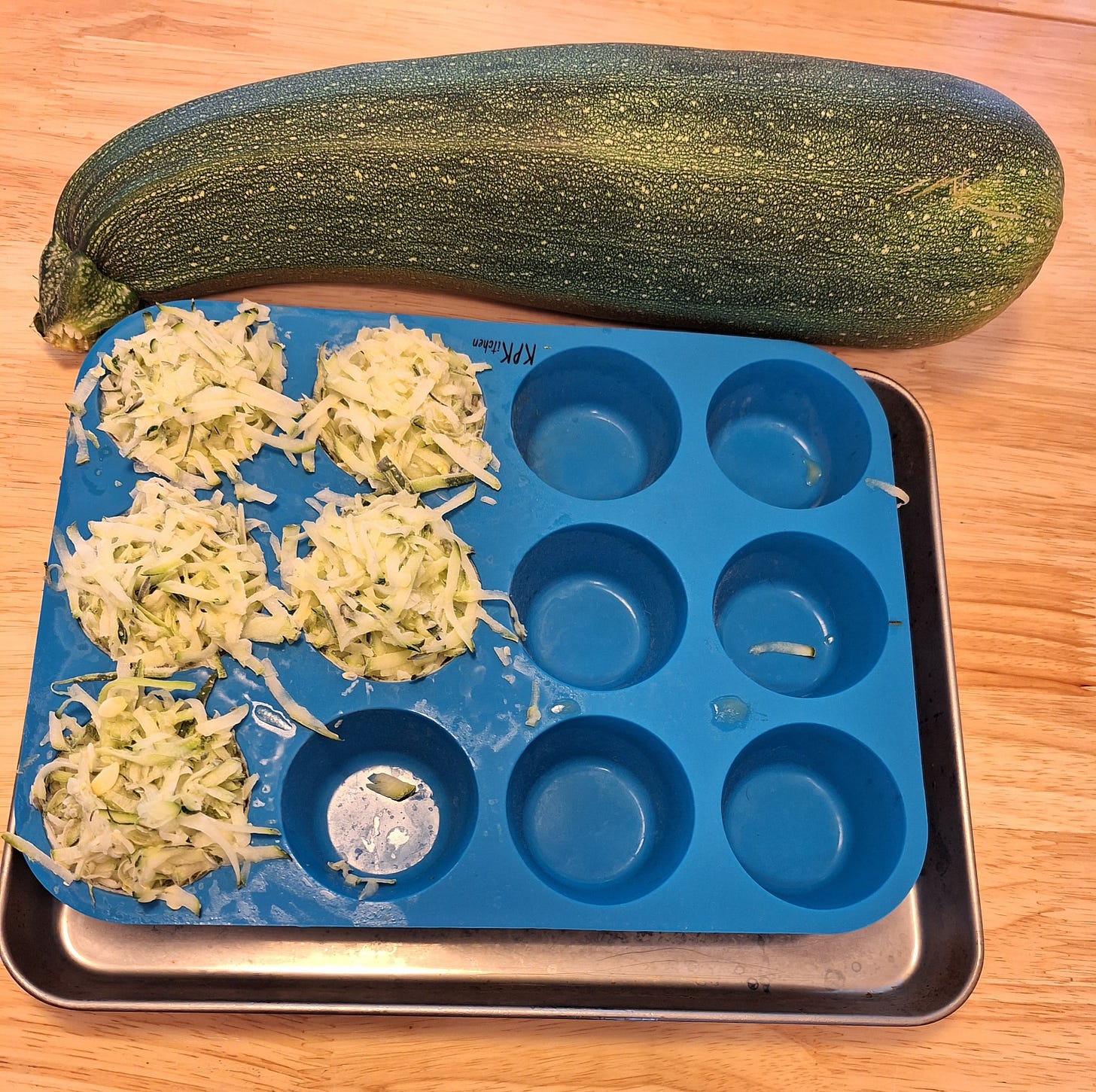 a big zucchini and portions of grated zuke