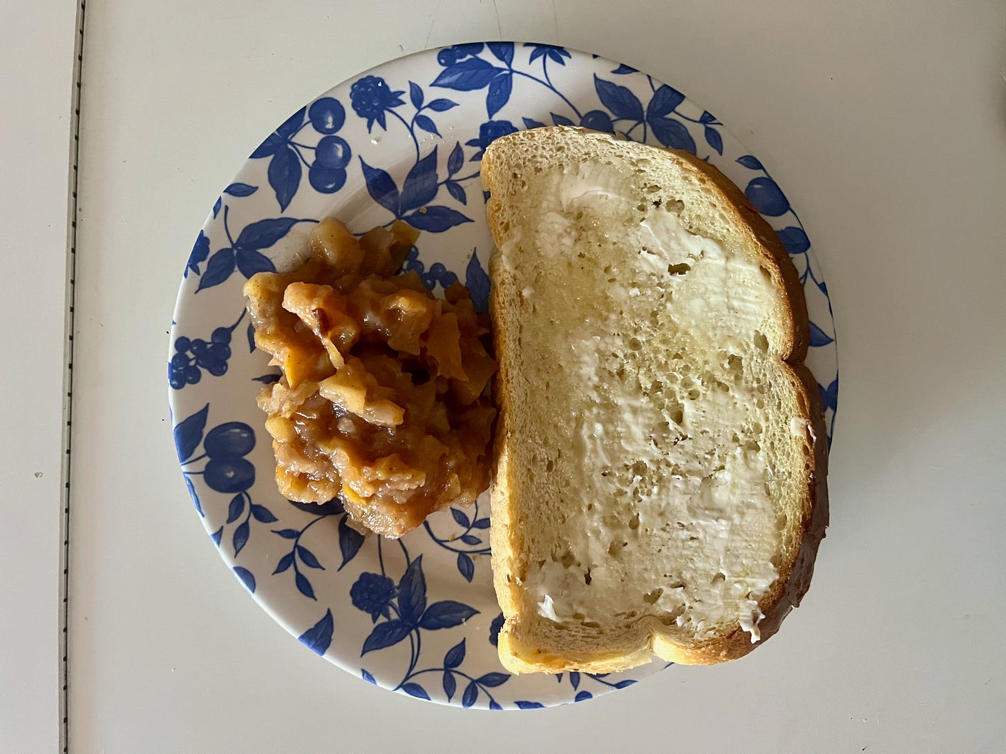 a plate with apple sauce and toast 