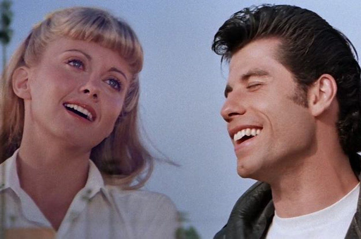 Sandy and Danny singing Summer Nights in Grease.