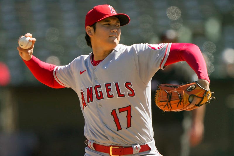 OAKLAND, CALIFORNIA - OCTOBER 05: Shohei Ohtani #17 of the Los Angeles Angels pitches against the Oakland Athletics in the bottom of the first inning at RingCentral Coliseum on October 05, 2022 in Oakland, California. (Photo by Thearon W. Henderson/Getty Images)
