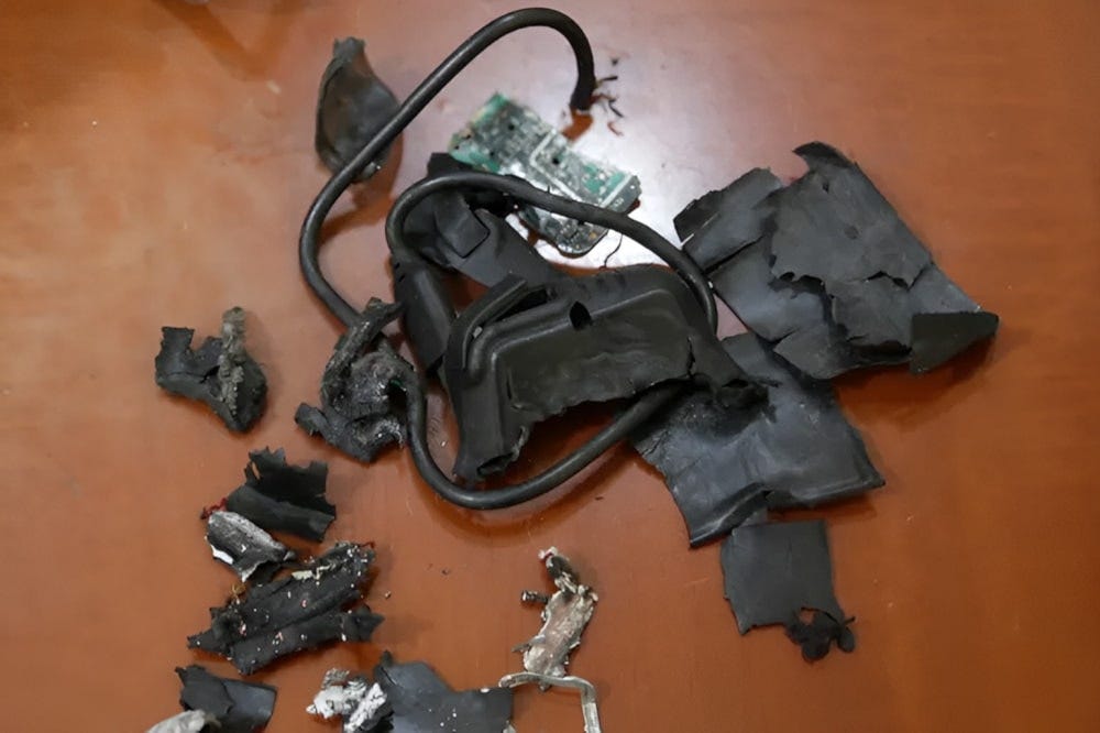 The remains of exploded Israeki-rigged pagers on display at an undisclosed location in September 2024 (AFP )