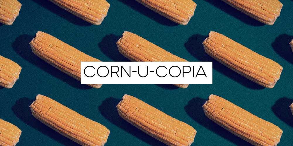 repeating corn on the cobs on dark green background with heavy shadows