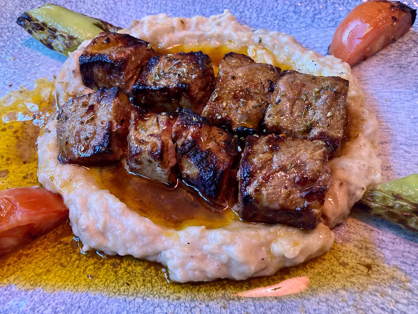 Alaz's grilled lamb on a bed of aubergine puree with grilled vegetables