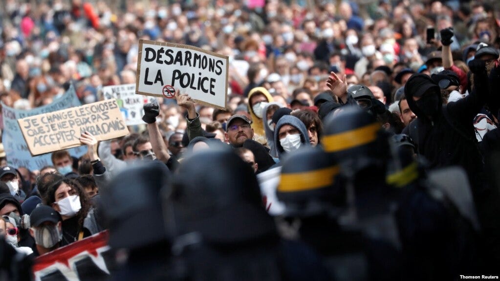 Demonstrators attend a protest against police brutality and the death in Minneapolis police custody of George Floyd, in Nantes, France, June 13, 2020. 