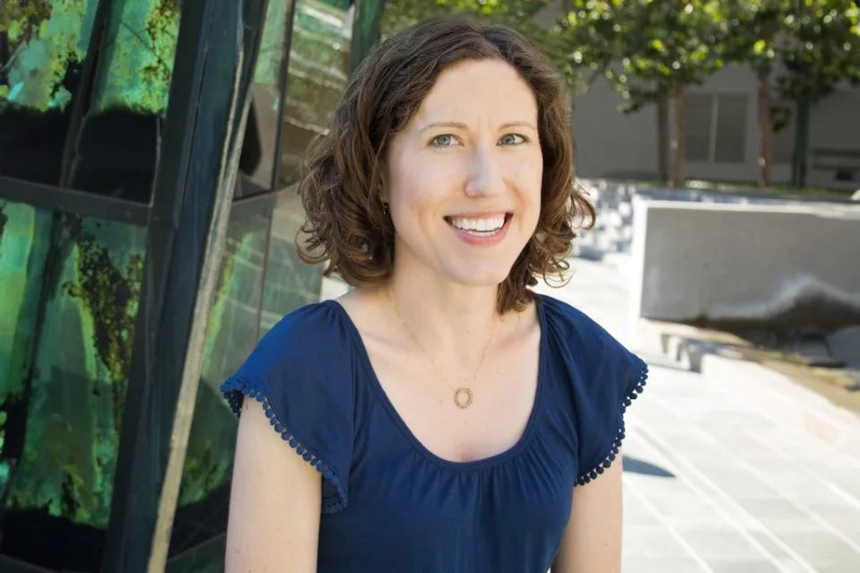 Open Research Director, Elizabeth Rhodes