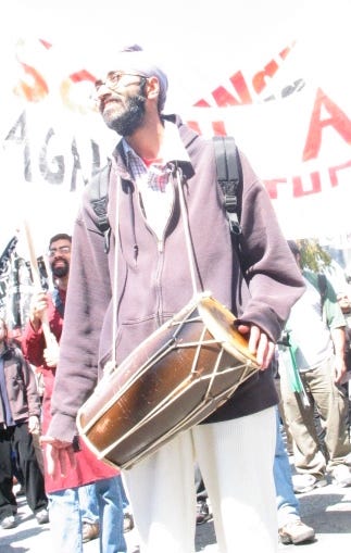 Picture of Birj at a protest in San Francisco