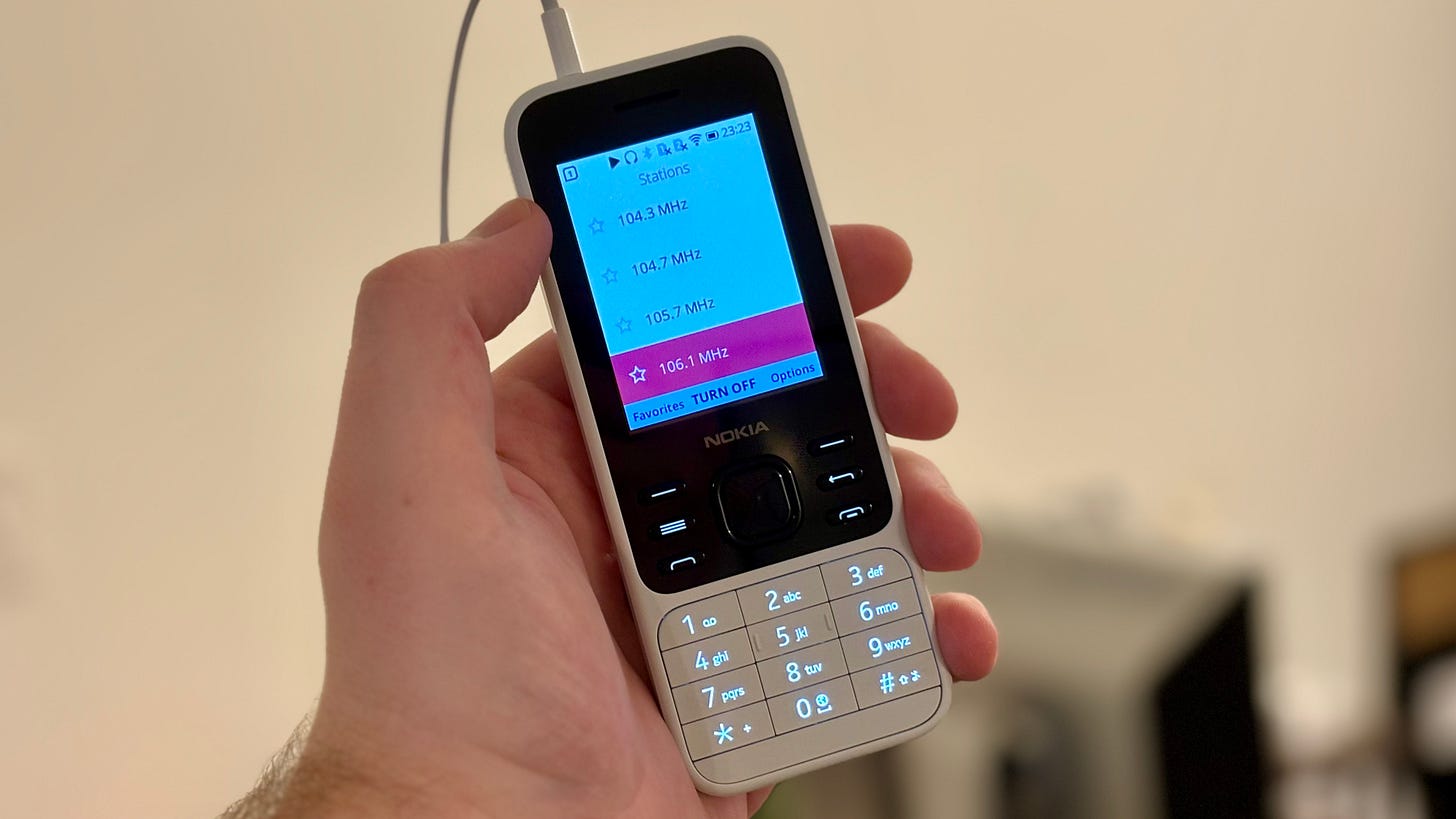 Feature phone with an FM radio app open