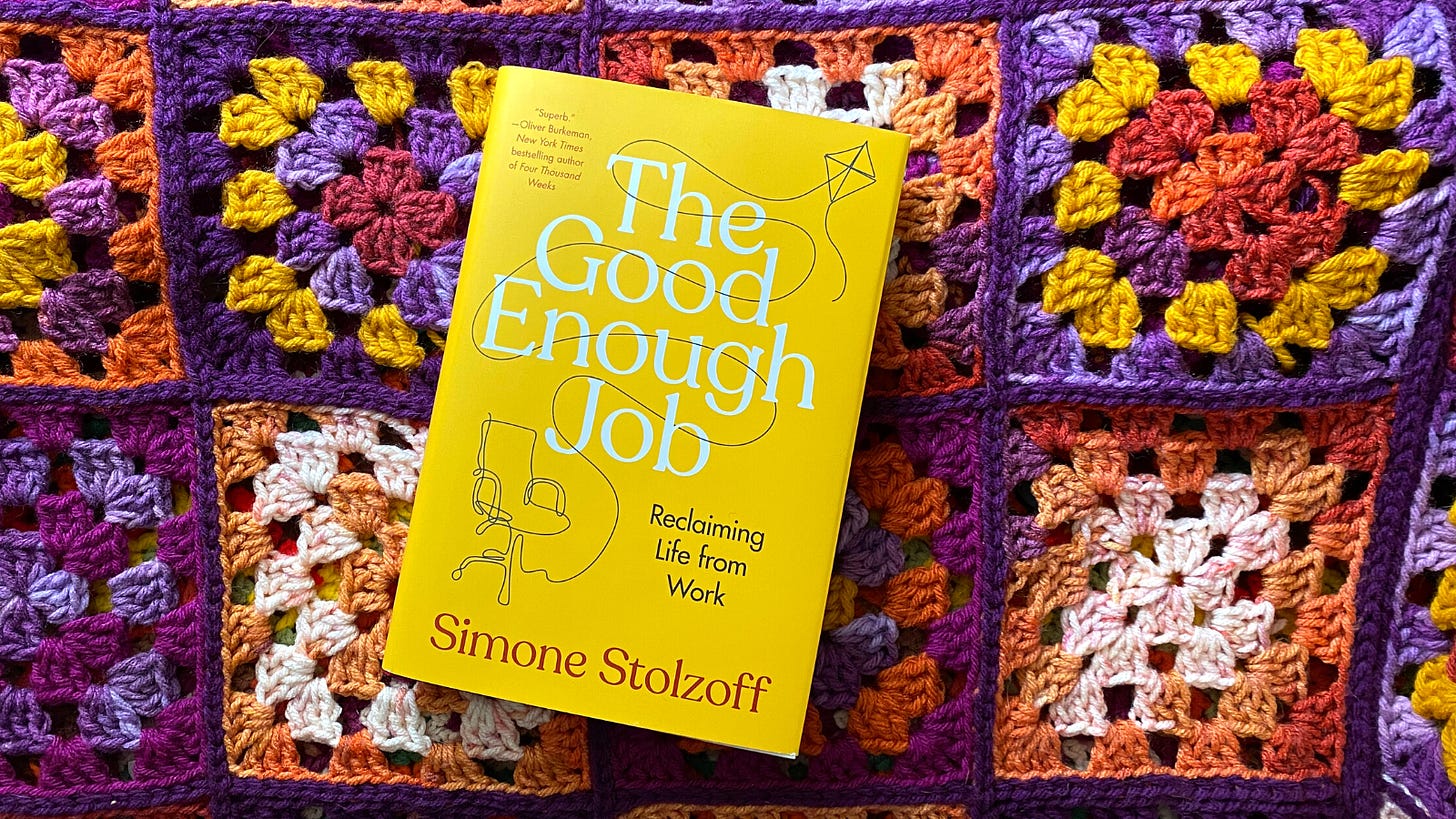 A copy of the book, The Good Enough Job, on a purple and orange crochet background