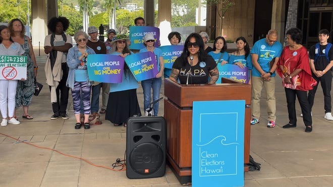 Advocates rally for "clean elections" in Hawaii.