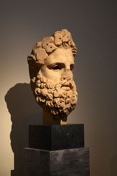 Partial head of Zeus in marble. A photograph taken with good shadows
