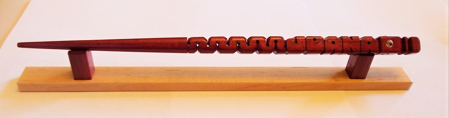 Wand in Purpleheart wood that I did for my neighbor a few years ago.