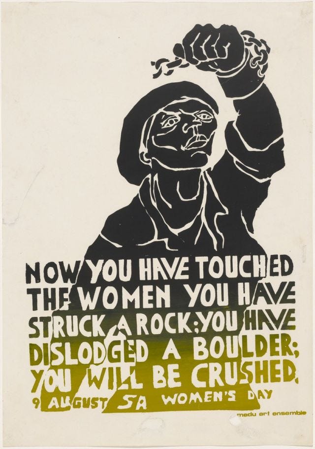 Black and yellow print showing a woman with her fist upraised, and a slogan at the bottom reading "Now you have touched the woman you have struck a rock; you have dislodged a boulder; you will be crushed.  9 August SA Women's Day"