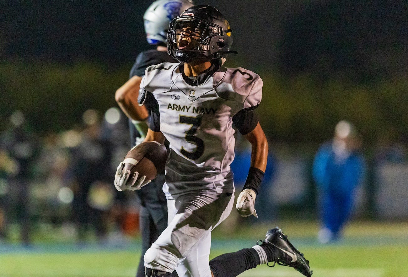 Nehemiah Brunson Jr. of the Army and Navy Academy in Carlsbad scores a touchdown last season. The senior committed to play football at Army next year and went to ANA to be coached by his father. Courtesy photo