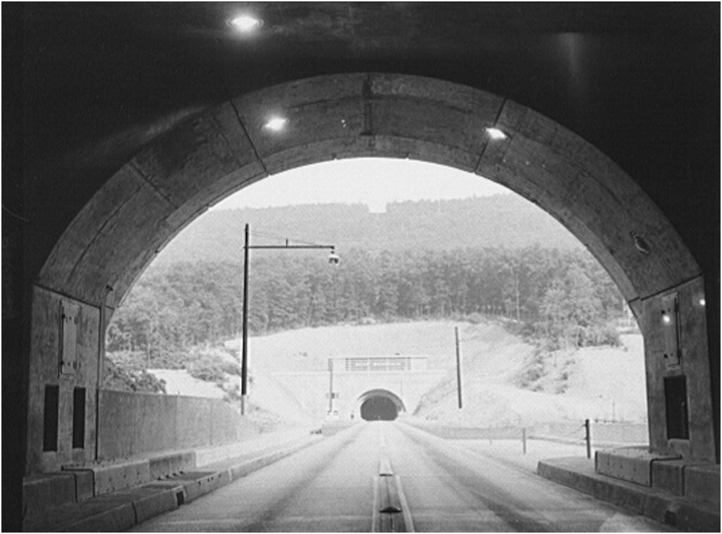 https://upload.wikimedia.org/wikipedia/commons/d/d1/Blue_Mountain_Tunnel_viewed_from_Kittatinny_Mountain_Tunnel_1942.jpg