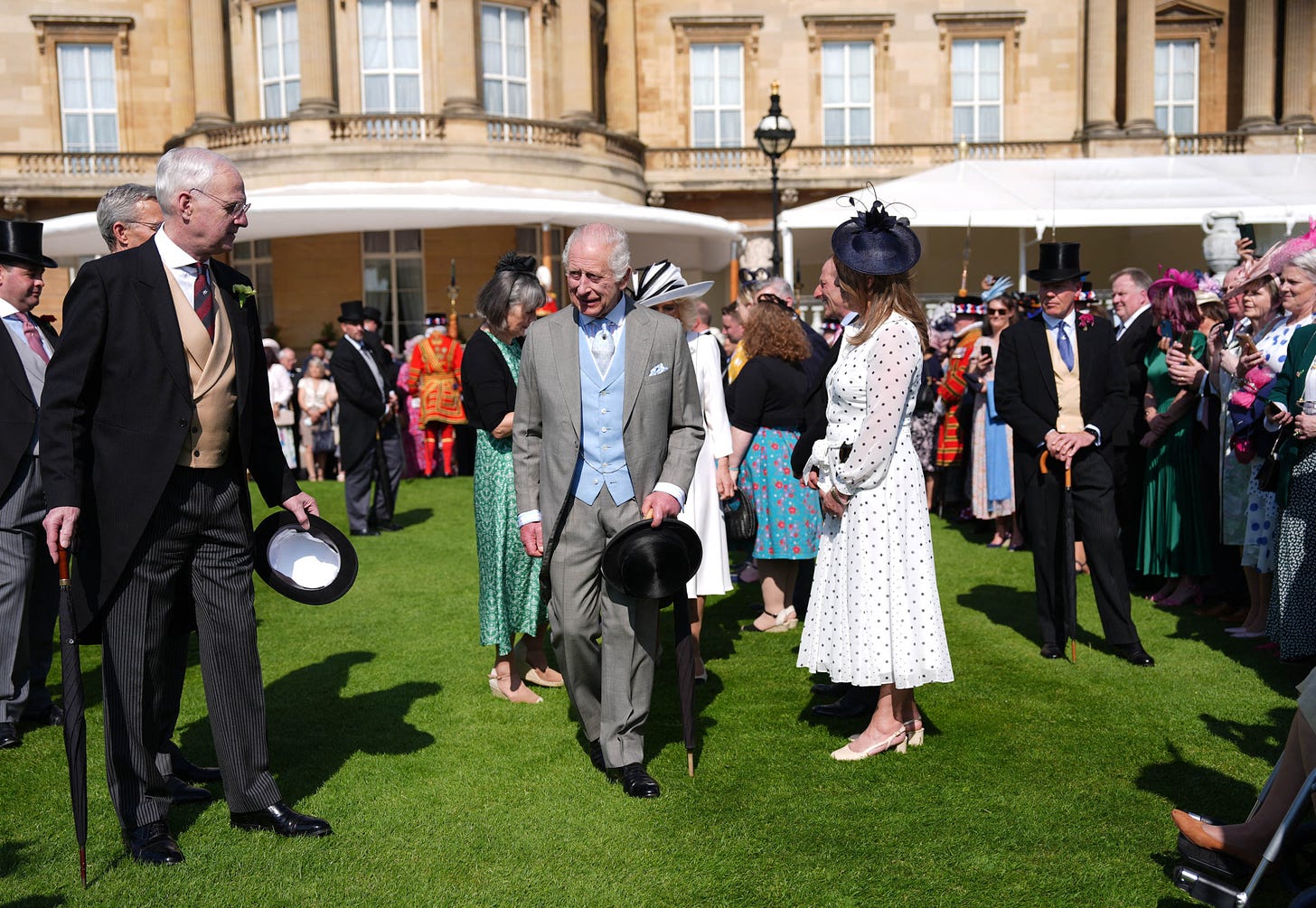 king charles hosts garden party at buckingham palace