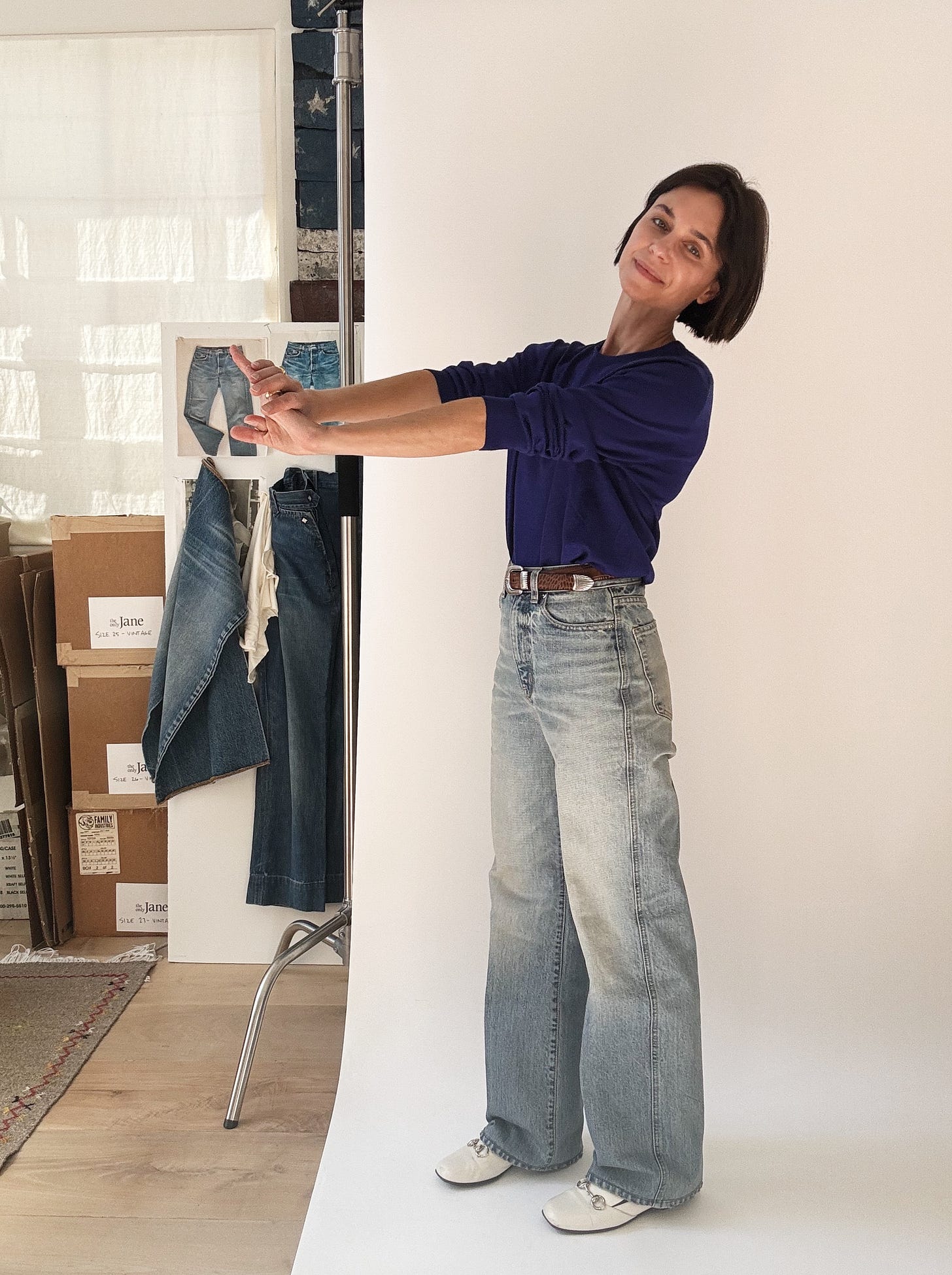 ruadh denim with croc belt and white loafers