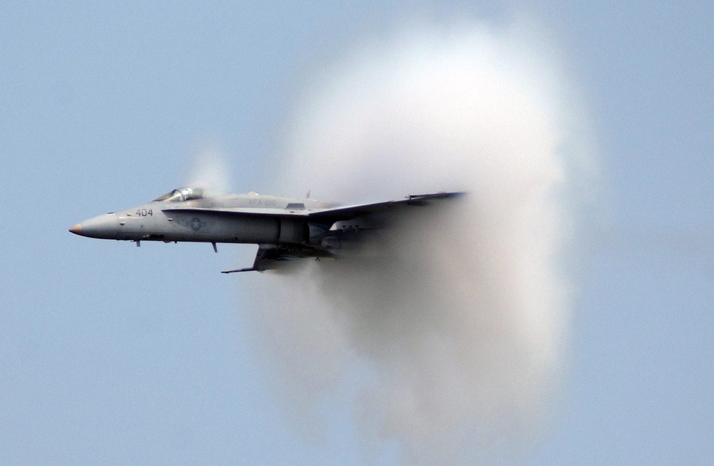 Fighter jet breaking the sound barrier