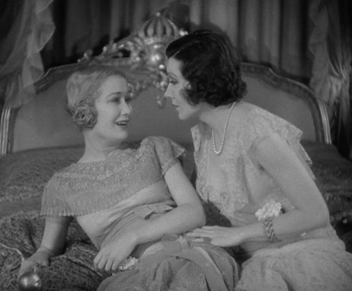 Miriam Hopkins and Claudette Colbert getting ever so slightly sapphic in a scene from The Smiling Lieutenant