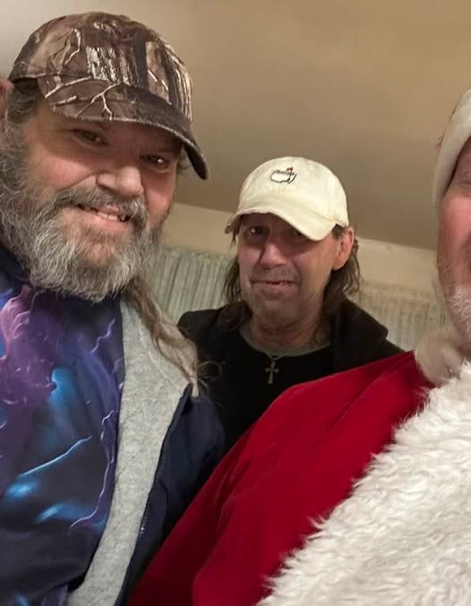 May be an image of 2 people and beard