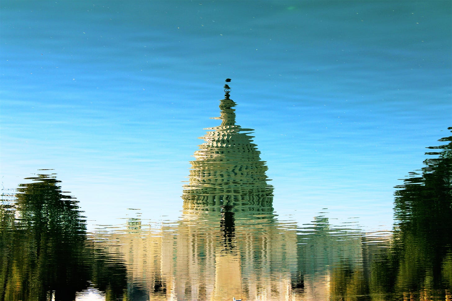 Photo by Kendall Hoopes: https://www.pexels.com/photo/reflection-of-gray-mosque-on-water-616852/