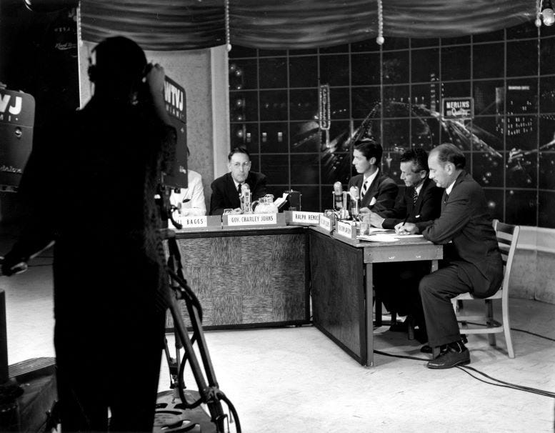 Ralph Renick (middle), participating in a panel which was broadcasted live on WTVJ on May 13, 1954.