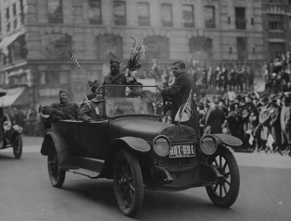 Department of Defense description: "Army Sgt. Henry Johnson waves to well-wishers during the 369th Infantry Regiment march up Fifth Avenue in New York City on Feb. 17, 1919, during a parade welcoming the New York National Guard unit home. Johnson was the first American to win the French military's highest honor during World War I."