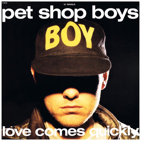 Album cover for "Love Comes Quickly" featuring Chris Lowe wearing a cap that says "BOY."